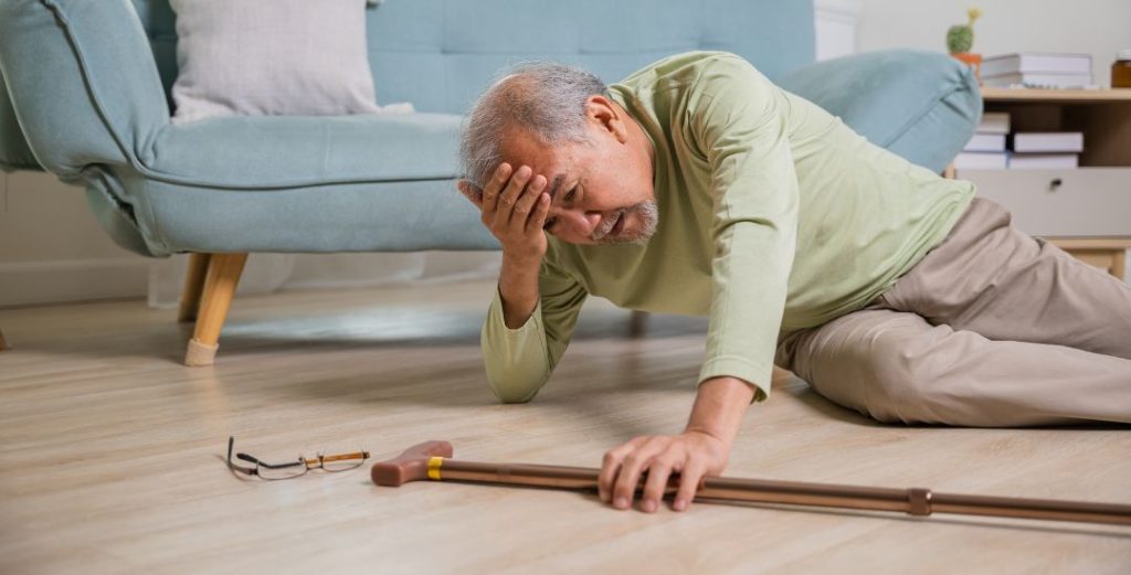elderly man on the floor after falling