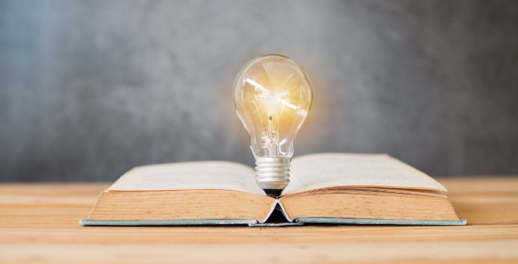 open book with lightbulb