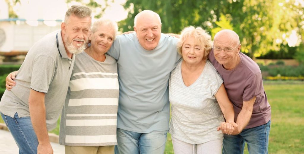 group of elderly people posing together