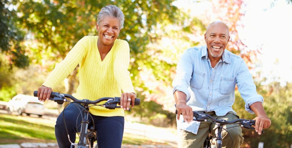 happy couple biking